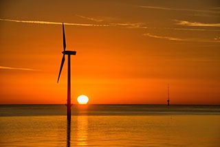 Image of an offshore windmill.
